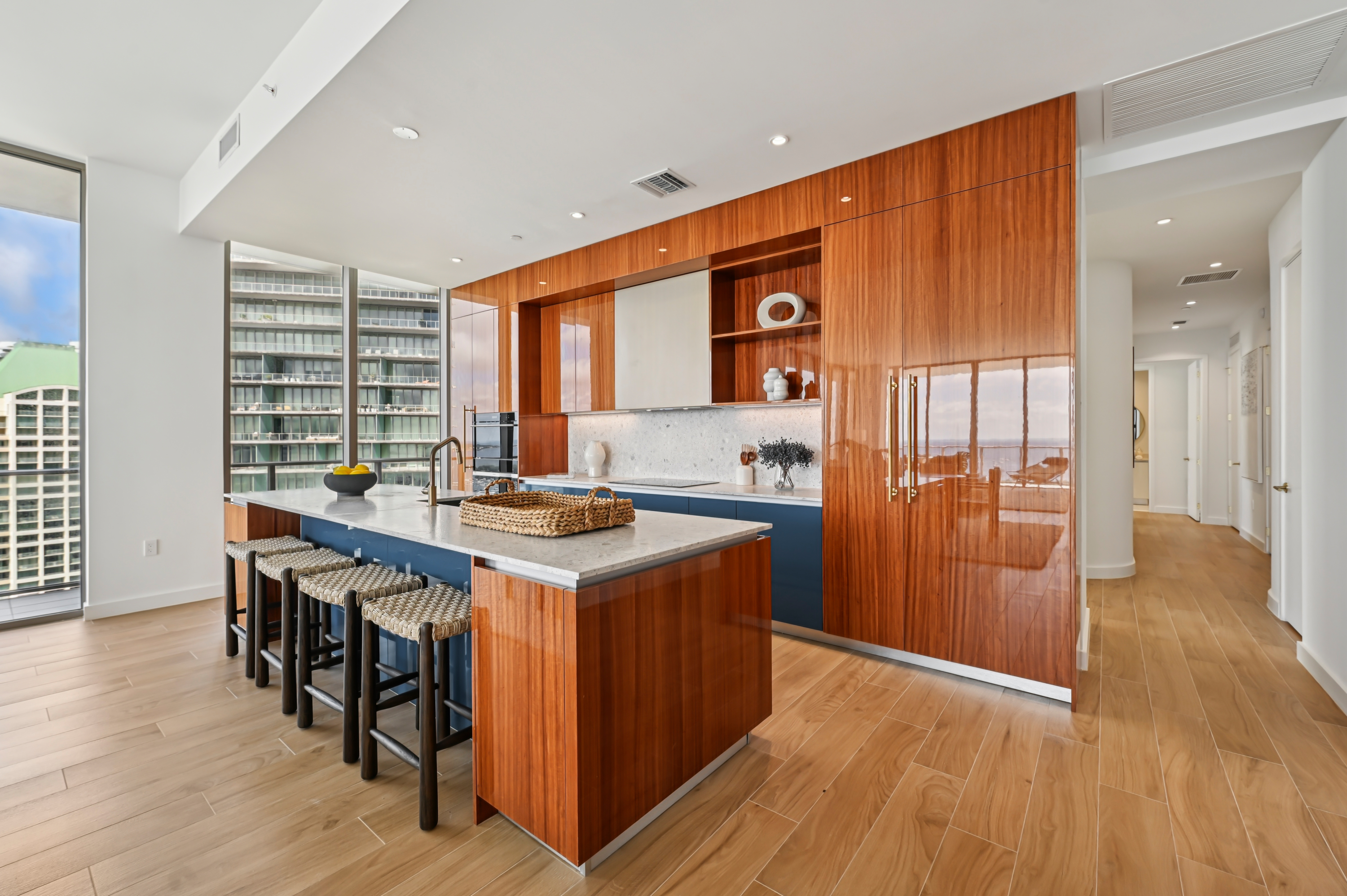 S Bayshore Dr modern kitchen with walnut cabinetry
